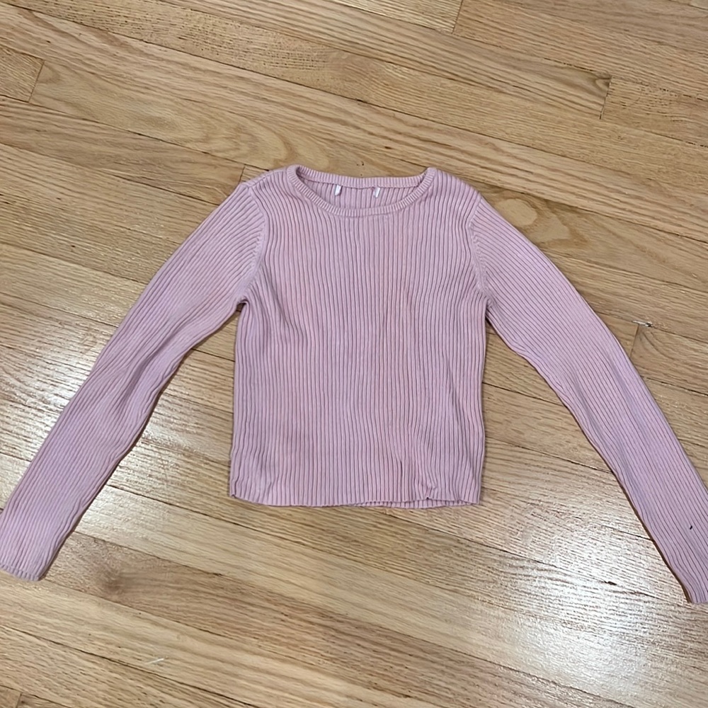 Pink Long Sleeve tight fitting shirt.